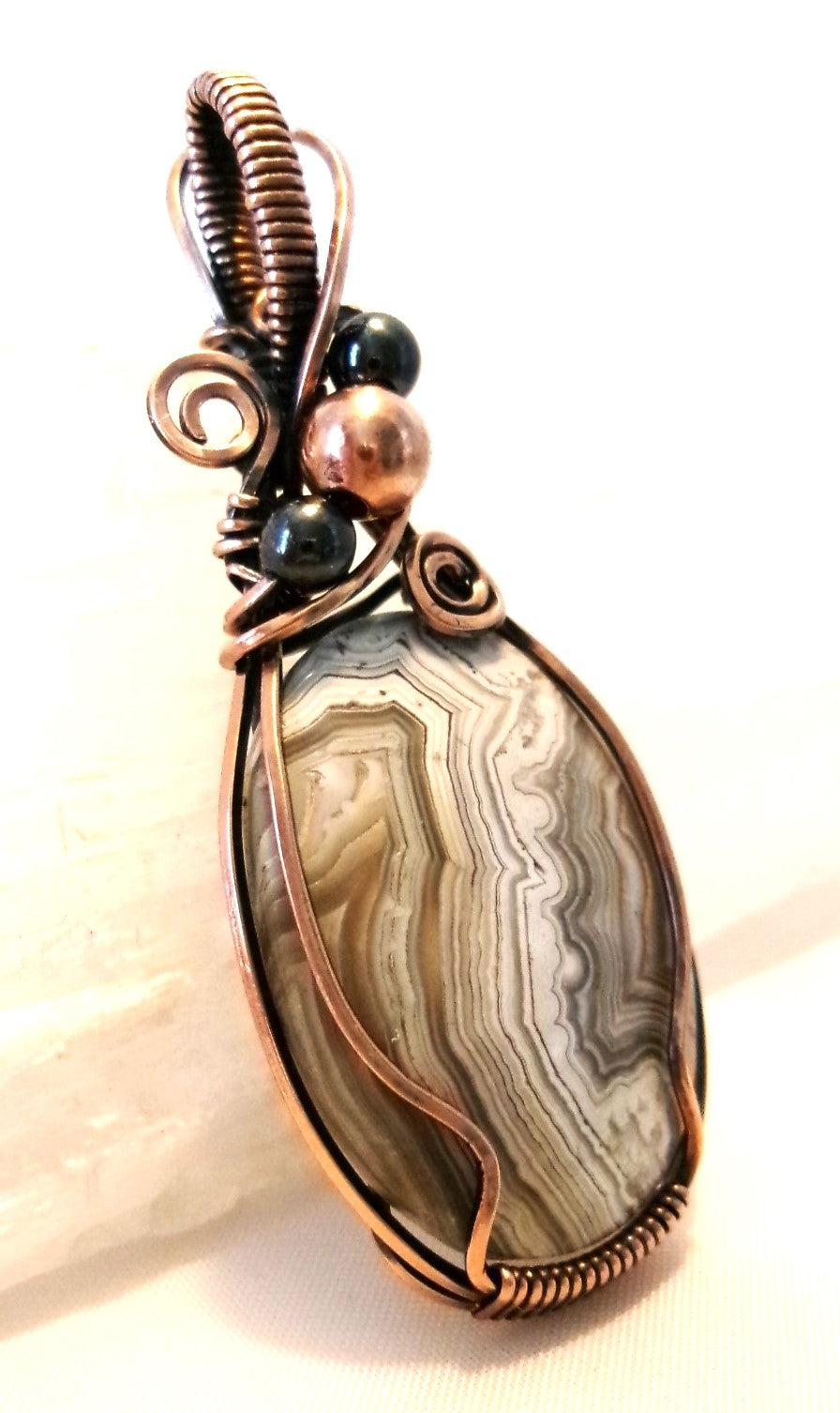 Crazy Lace Agate gemstone copper wire wrapped crystal pendant with hematite and copper accent beads