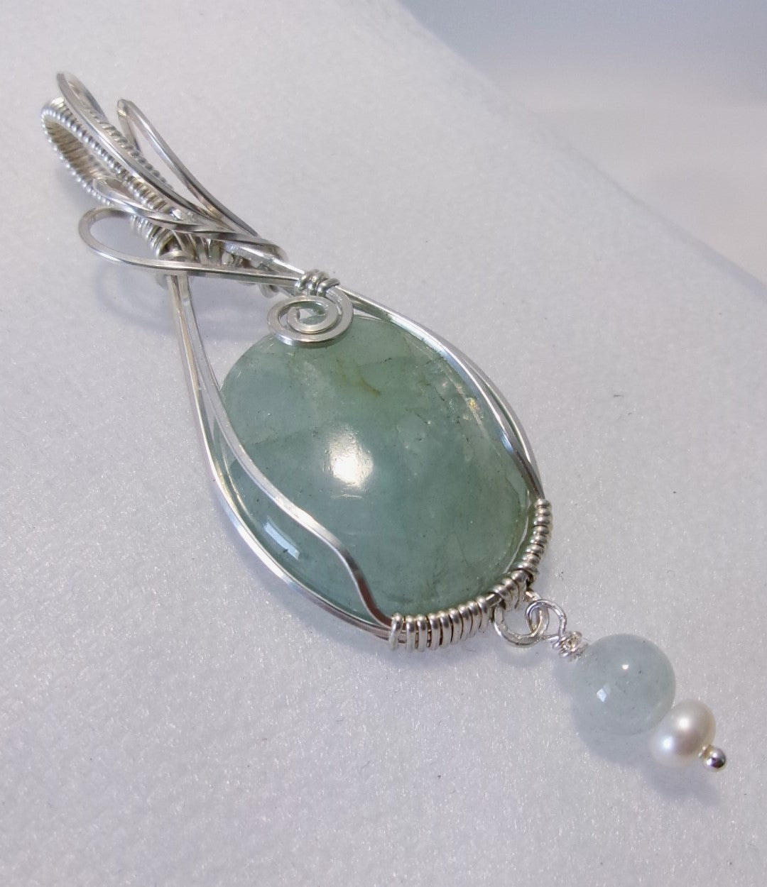 Aquamarine gemstone sterling silver wire wrapped crystal pendant with a green angelite and freshwater pearl dangle