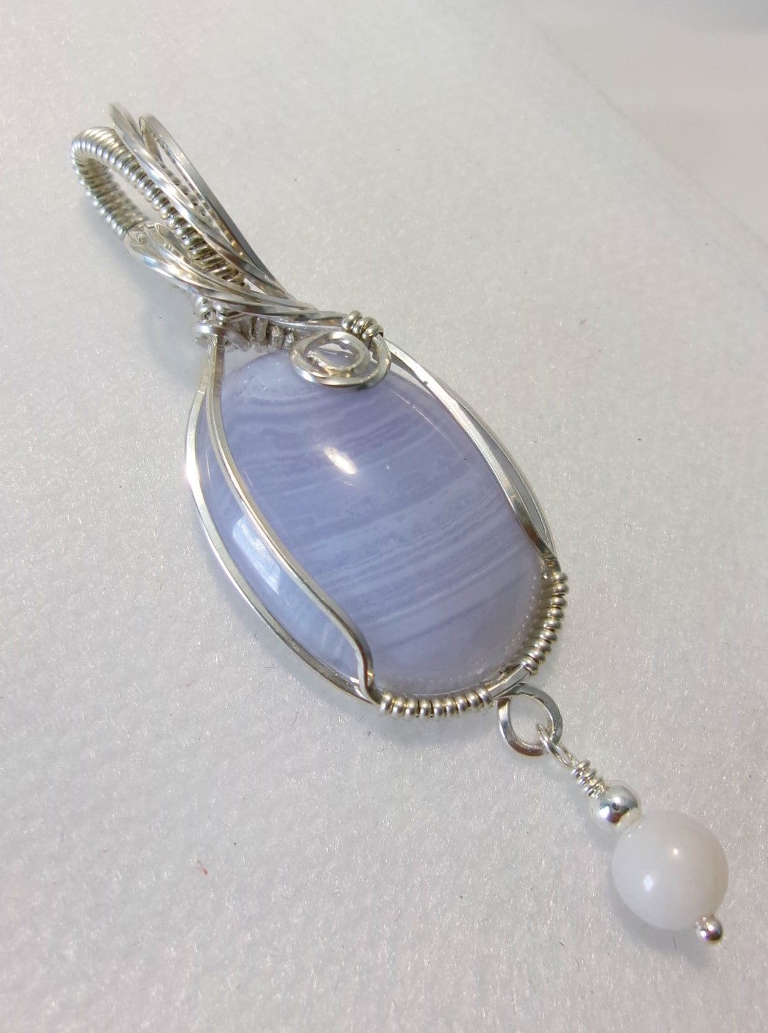 Blue Lace Agate gemstone sterling silver wire wrapped crystal pendant with a snow quartz and sterling silver bead dangle