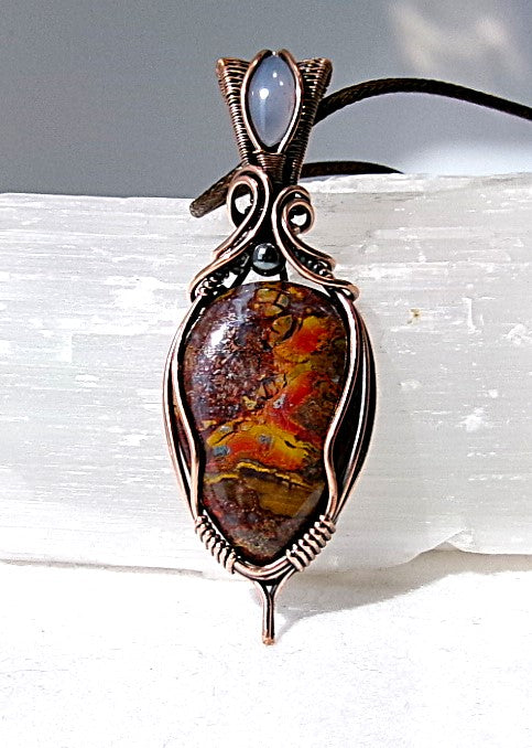 Agatized Jasper gemstone copper wire wrapped crystal pendant with blue chalcedony gemstone set in a woven bail and hematite accent bead