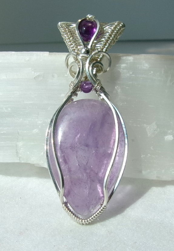 Amethyst gemstone sterling silver wire wrapped crystal pendant with amethyst gemstone set in a woven bail with amethyst and sterling silver accent beads