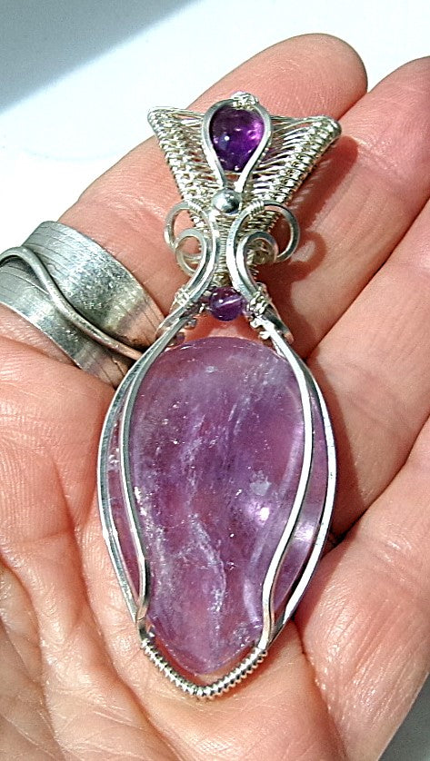 Amethyst gemstone sterling silver wire wrapped crystal pendant with amethyst gemstone set in a woven bail with amethyst and sterling silver accent beads