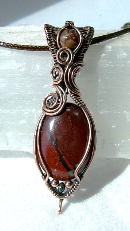 Red Jasper gemstone copper wire wrapped crystal pendant with leopard skin jasper gemstone set in a woven bail with copper and hematite accent beads