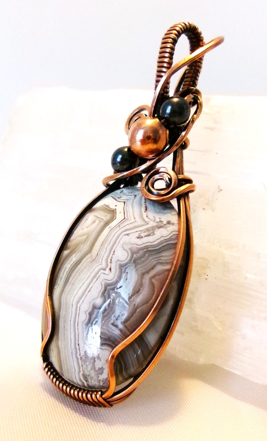 Crazy Lace Agate gemstone copper wire wrapped crystal pendant with hematite and copper accent beads