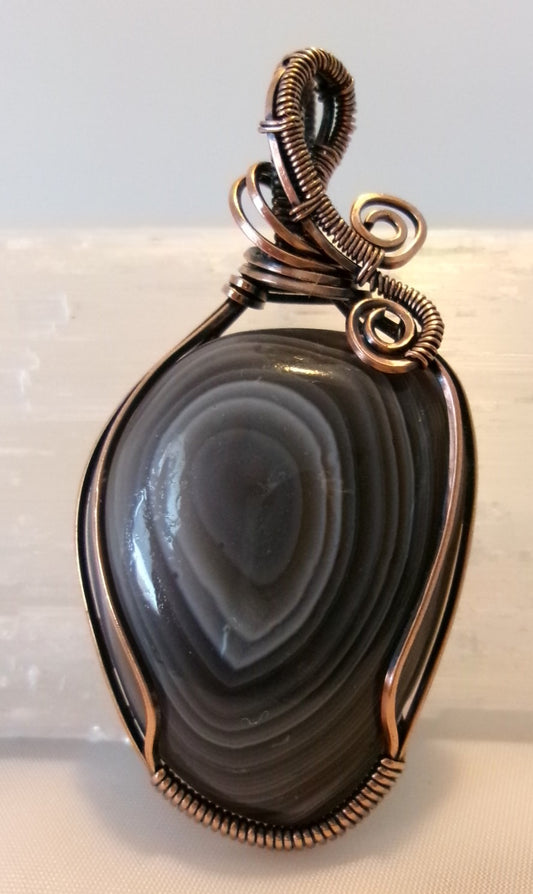 Botswana Agate gemstone copper wire wrapped crystal pendant