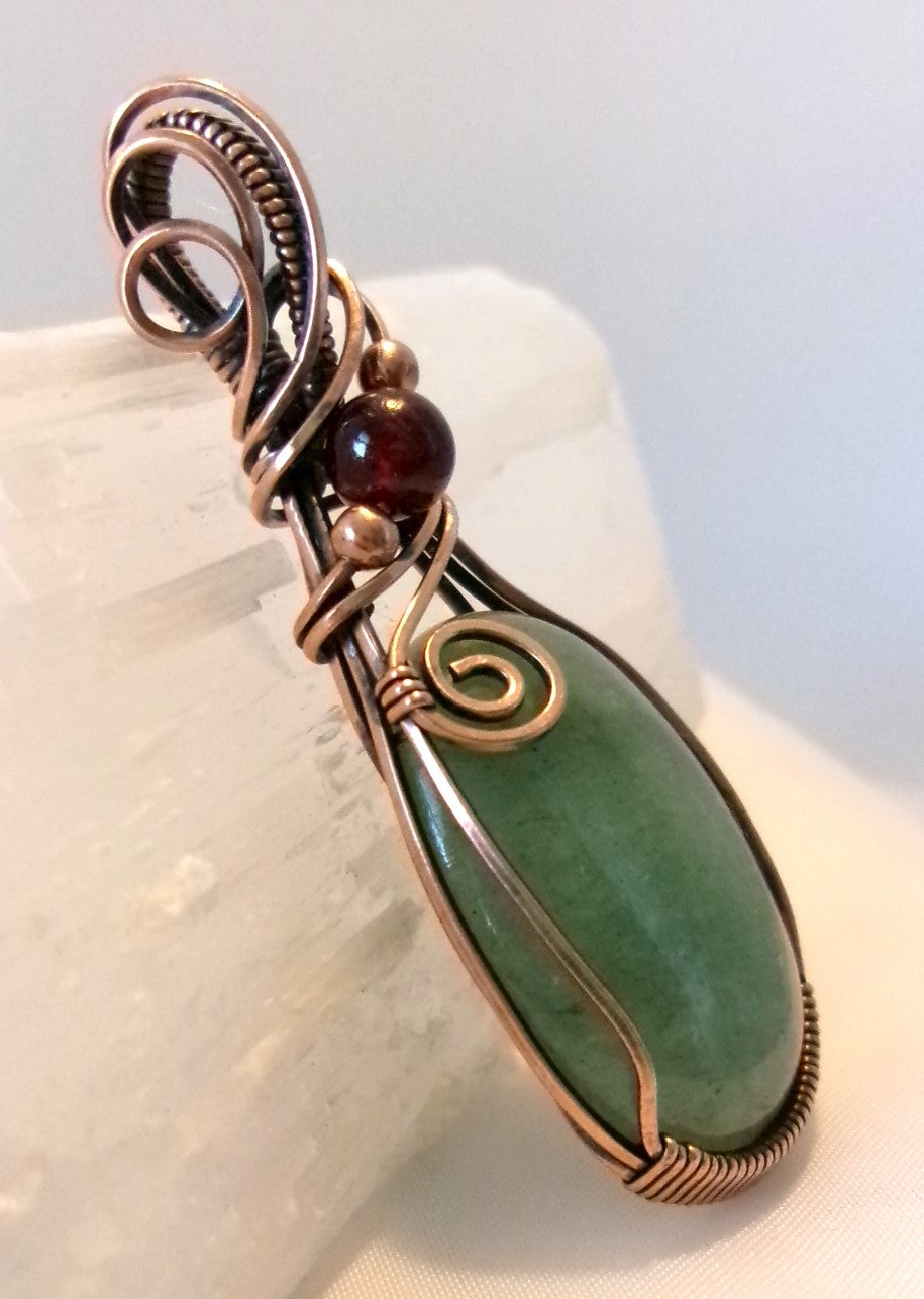 Green Aventurine gemstone copper wire wrapped crystal pendant with garnet and copper accent beads