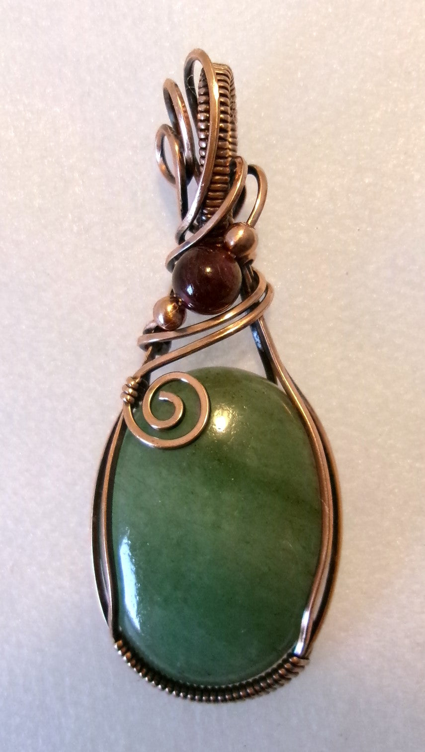 Green Aventurine gemstone copper wire wrapped crystal pendant with garnet and copper accent beads