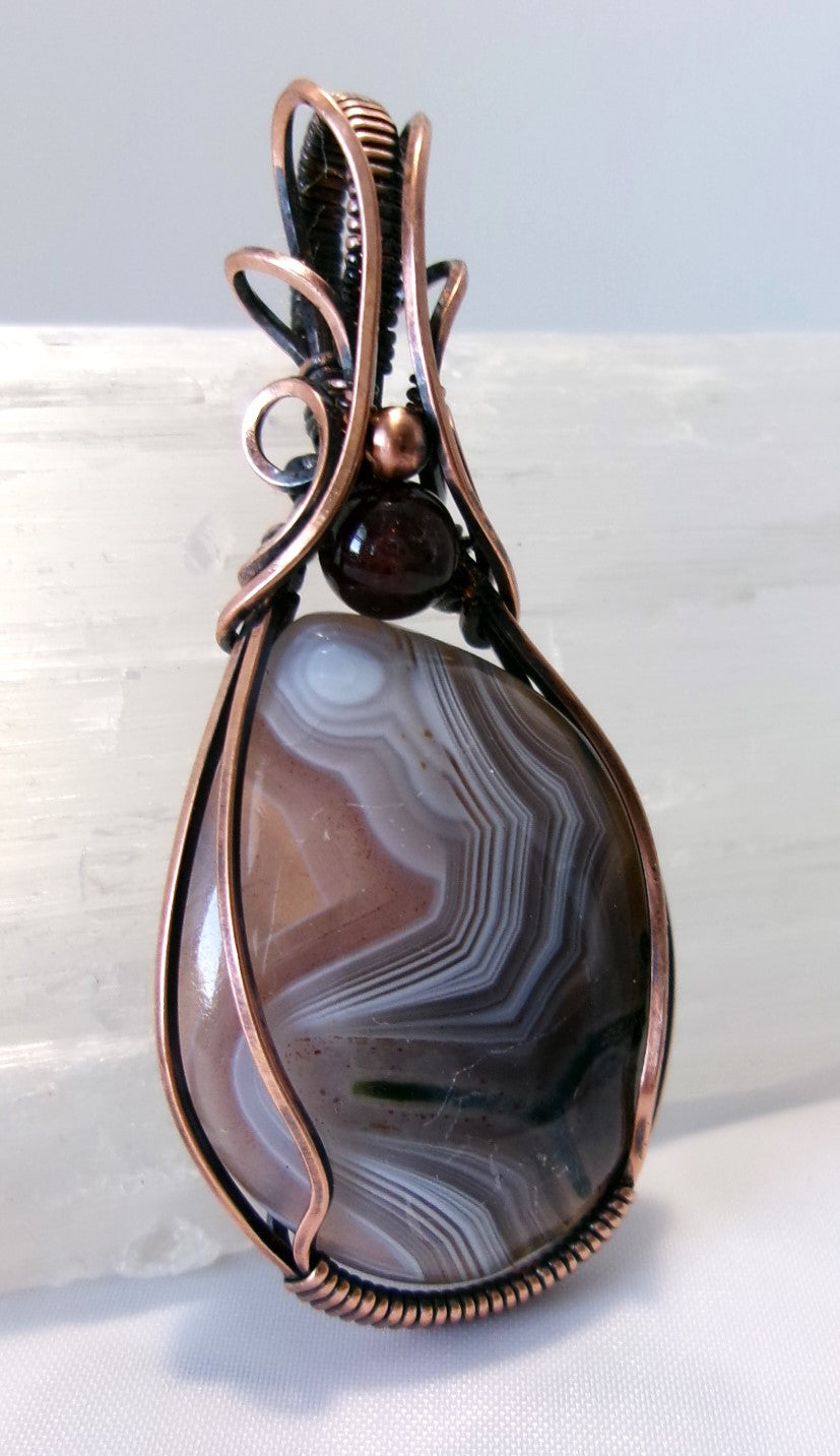 Botswana Agate gemstone copper wire wrapped crystal pendant with garnet and copper accent beads