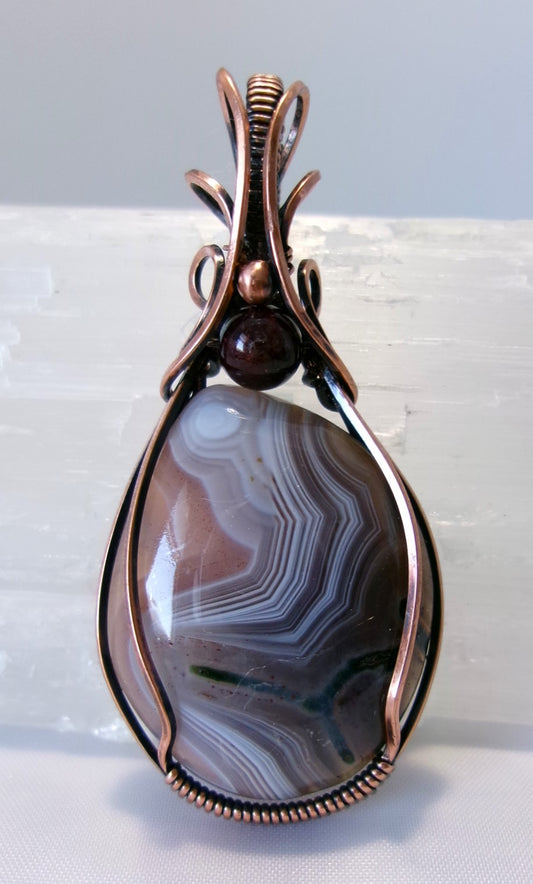 Botswana Agate gemstone copper wire wrapped crystal pendant with garnet and copper accent beads