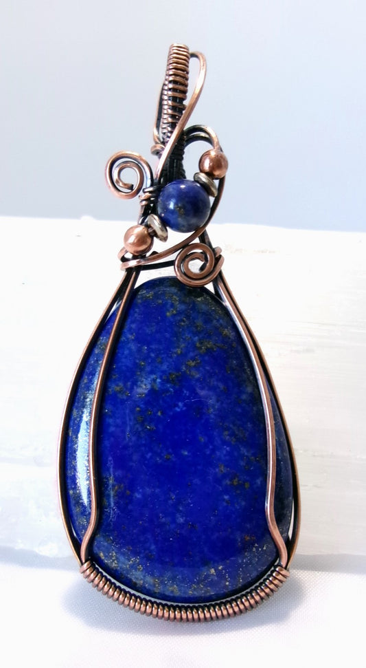 Lapis Lazuli gemstone copper wire wrapped crystal pendant with lapis lazuli, copper, and silver accent beads