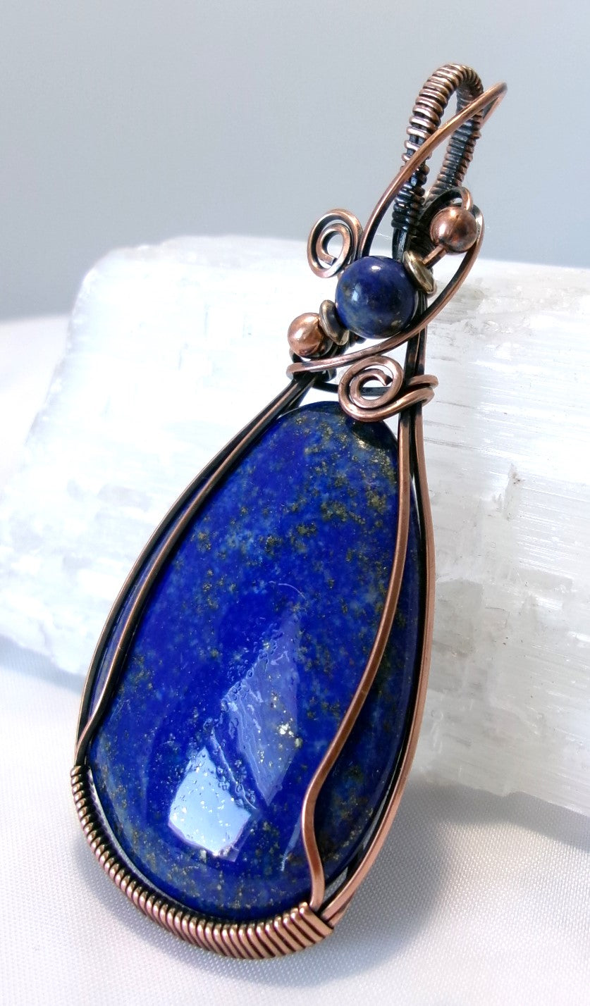 Lapis Lazuli gemstone copper wire wrapped crystal pendant with lapis lazuli, copper, and silver accent beads