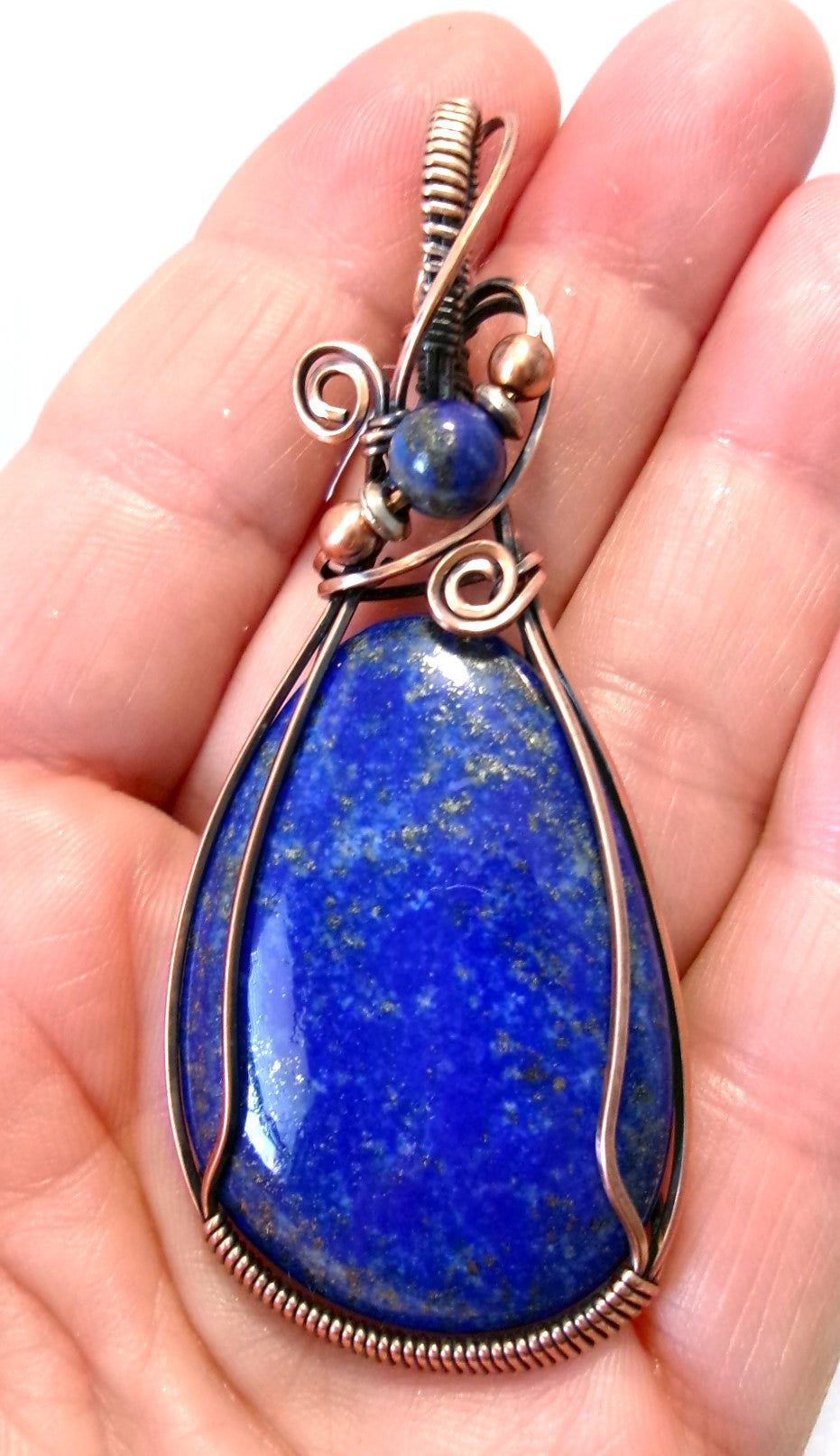 Lapis Lazuli gemstone copper wire wrapped crystal pendant with lapis lazuli, copper, and silver accent beads