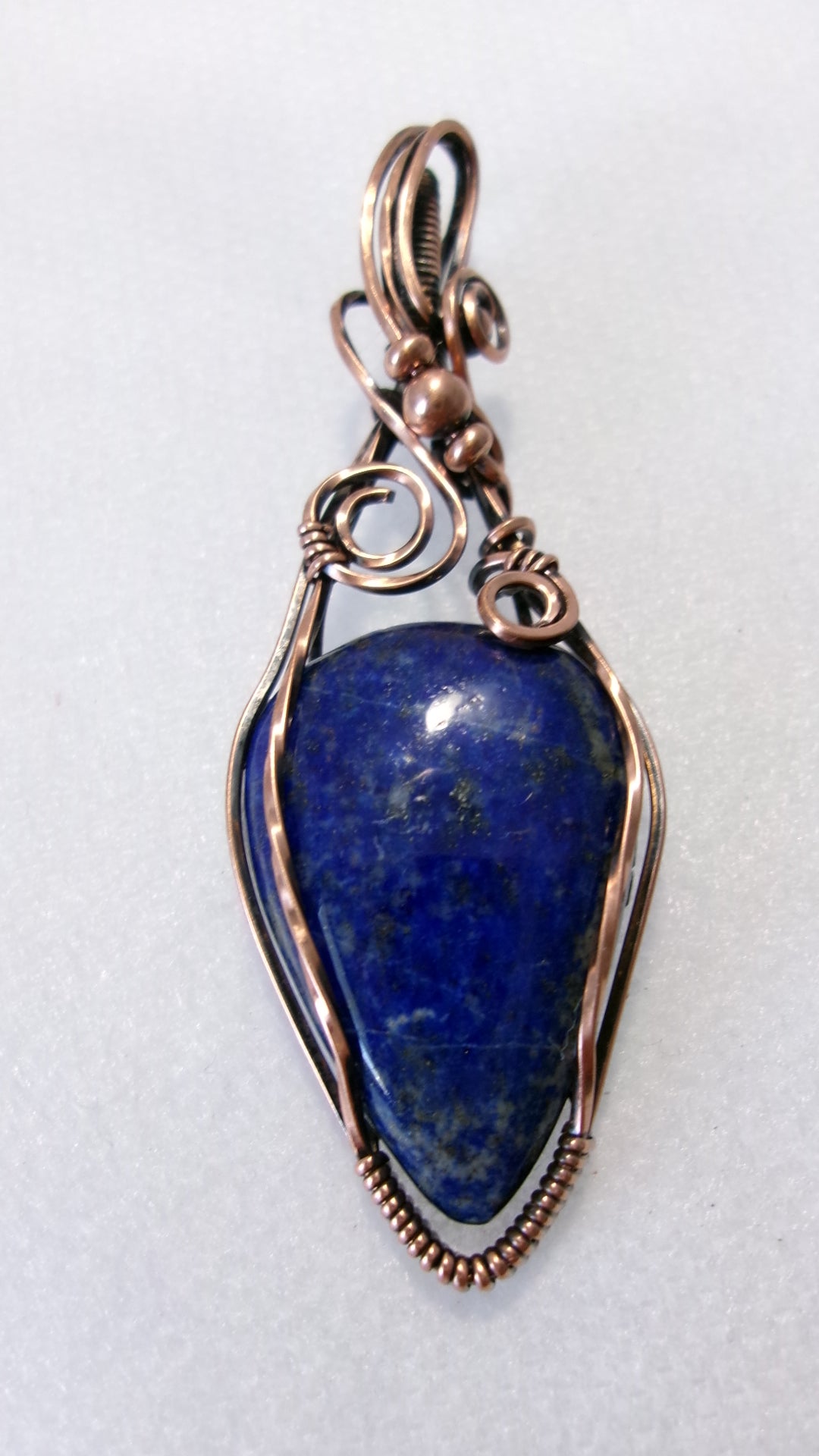 Lapis Lazuli gemstone copper wire wrapped crystal pendant with copper accent beads