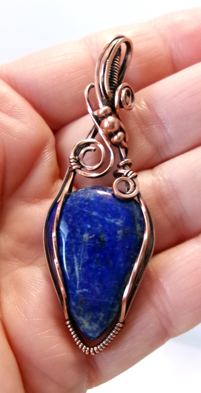Lapis Lazuli gemstone copper wire wrapped crystal pendant with copper accent beads