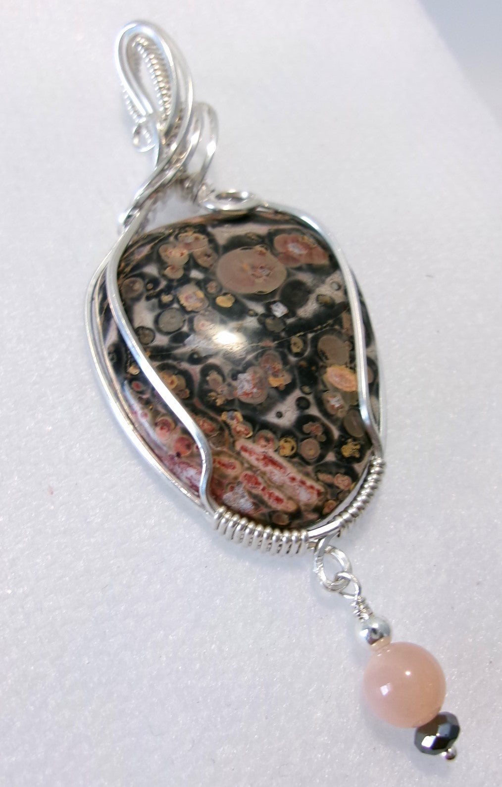 Leopard Skin Jasper gemstone sterling silver wire wrapped crystal pendant with a sunstone, hematite, and sterling silver bead dangle