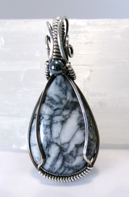 Pinolith gemstone sterling silver wire wrapped crystal pendant with hematite and sterling silver accent beads