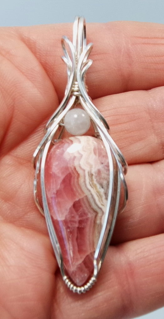 Rhodochrosite gemstone sterling silver wire wrapped crystal pendant with white quartz accent bead