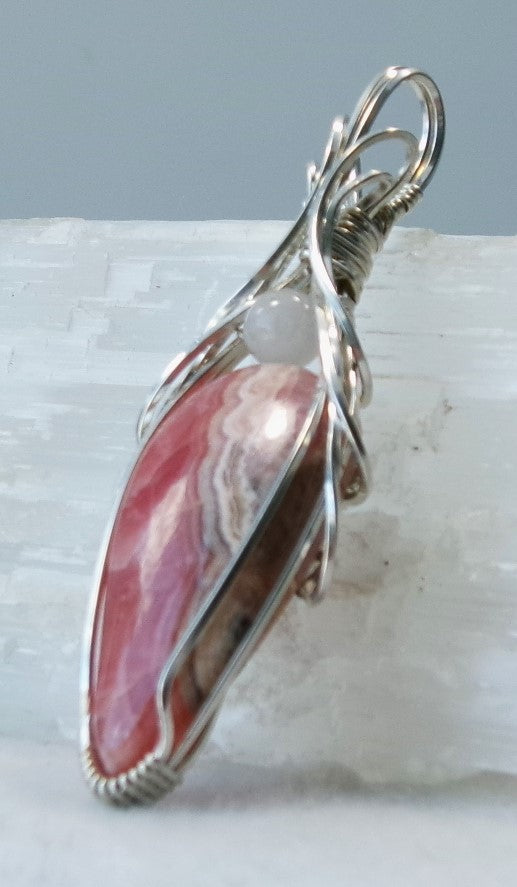 Rhodochrosite gemstone sterling silver wire wrapped crystal pendant with white quartz accent bead