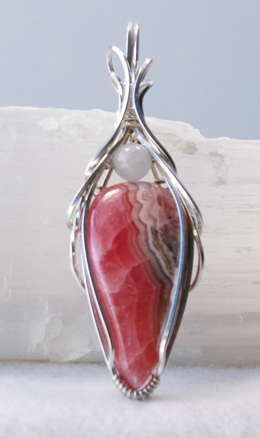 Rhodochrosite gemstone sterling silver wire wrapped crystal pendant with white quartz accent bead