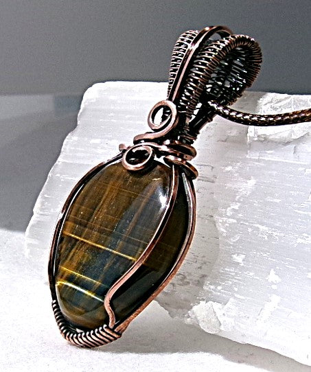 Blue Tiger’s Eye gemstone copper wire wrapped crystal pendant with a woven bail and swirls