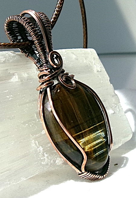 Blue Tiger’s Eye gemstone copper wire wrapped crystal pendant with a woven bail and swirls