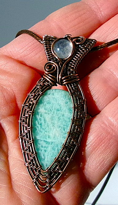 Amazonite gemstone copper wire wrapped crystal pendant with rainbow moonstone bail stone