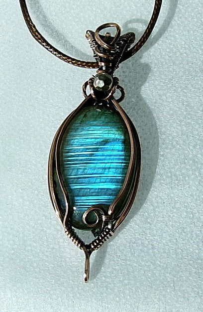 Labradorite gemstone copper wire wrapped crystal pendant with silver accent bead