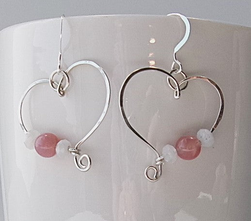 Pink Botswana agate and moonstone sterling silver wire earrings in a heart shape design with a tiny spiral