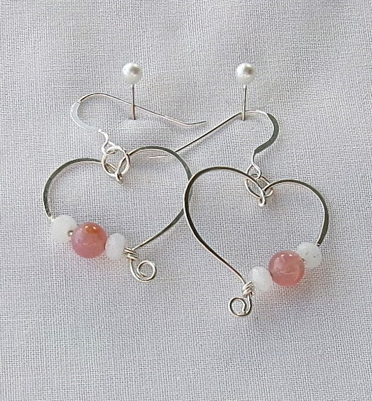 Pink Botswana agate and moonstone sterling silver wire earrings in a heart shape design with a tiny spiral