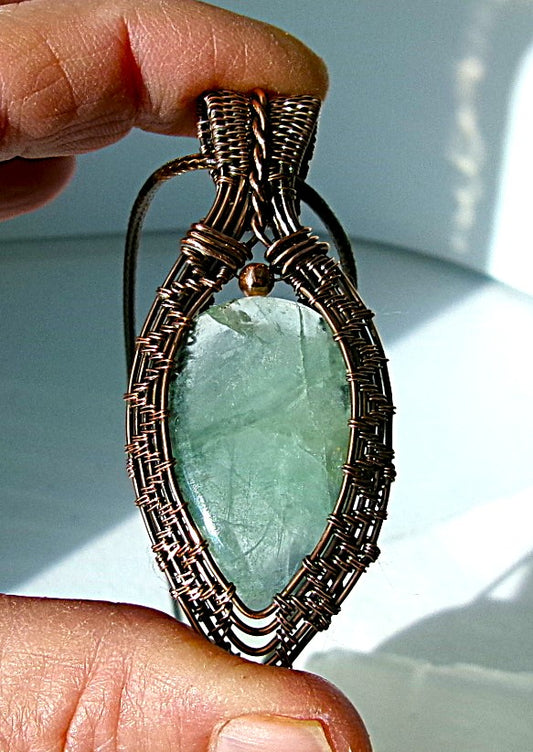 Green Fluorite gemstone copper wire wrapped crystal pendant with a copper accent bead