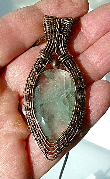 Green Fluorite gemstone copper wire wrapped crystal pendant with a copper accent bead