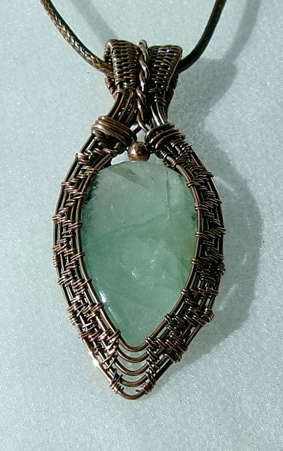 Green Fluorite gemstone copper wire wrapped crystal pendant with a copper accent bead