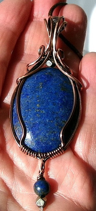 Lapis Lazuli gemstone copper wire wrapped crystal pendant with a beaded dangle features pyrite and lapis accent beads