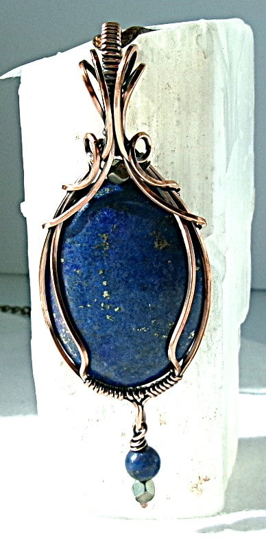Lapis Lazuli gemstone copper wire wrapped crystal pendant with a beaded dangle features pyrite and lapis accent beads