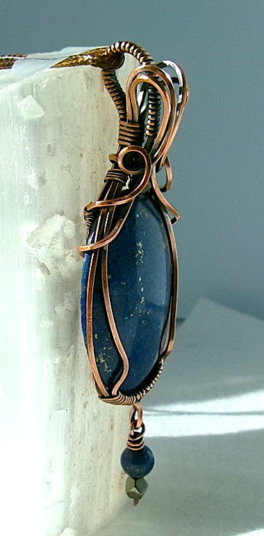 Lapis Lazuli gemstone copper wire wrapped crystal pendant with a beaded dangle features pyrite and lapis accent beads