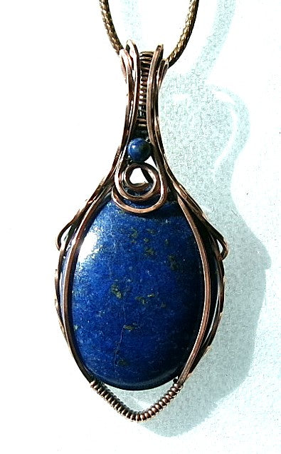 Lapis Lazuli gemstone copper wire wrapped crystal pendant with lapis accent bead and spiral