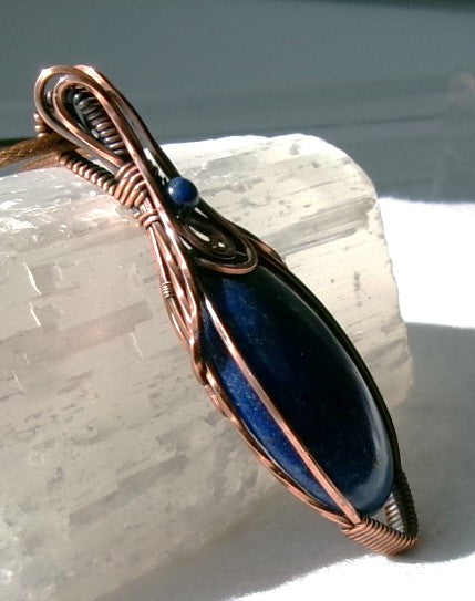 Lapis Lazuli gemstone copper wire wrapped crystal pendant with lapis accent bead and spiral