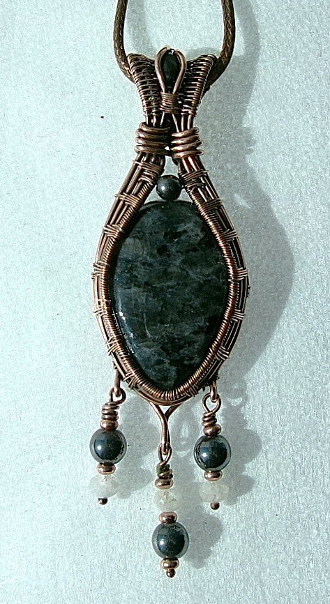 Larvikite gemstone copper wire wrapped crystal pendant with black onyx bail stone and 3 dangles