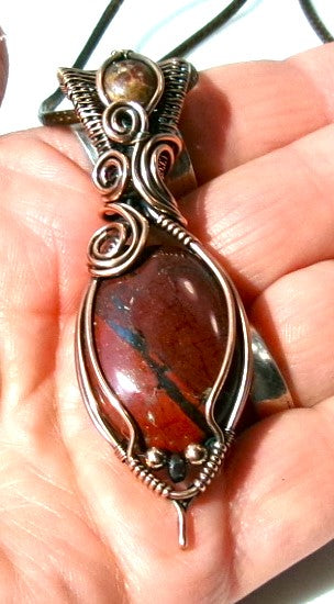 Red Jasper gemstone copper wire wrapped crystal pendant with leopard skin jasper gemstone set in a woven bail with copper and hematite accent beads