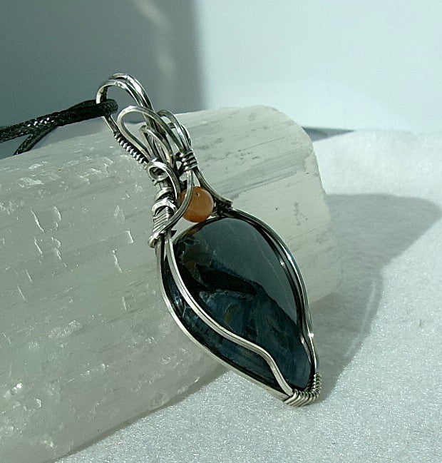 Pietersite gemstone sterling silver wire wrapped crystal pendant with apricot Botswana agate accent bead