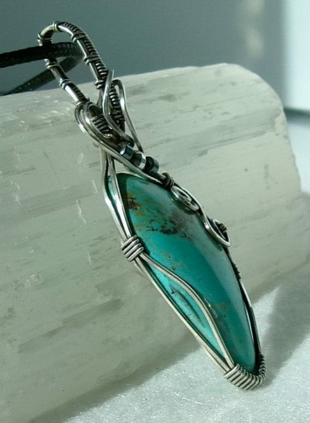 Turquoise gemstone sterling silver wire wrapped crystal pendant with hematite and sterling silver accent beads