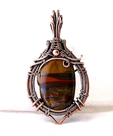 Tiger iron gemstone copper wire wrapped crystal pendant with copper accent bead
