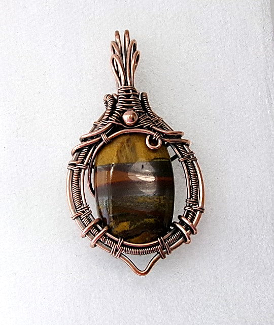 Tiger iron gemstone copper wire wrapped crystal pendant with copper accent bead