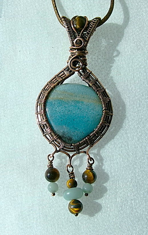 Trolleite gemstone copper wire wrapped crystal pendant with tiger’s eye bail stone and 3 dangles