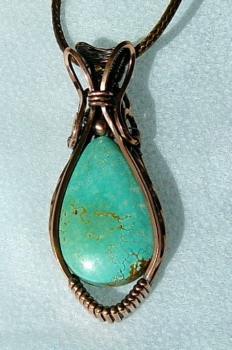 Turquoise gemstone copper wire wrapped crystal pendant with copper accent bead