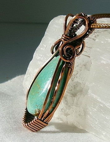 Turquoise gemstone copper wire wrapped crystal pendant with copper accent bead