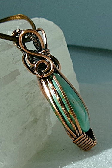 Turquoise gemstone copper wire wrapped crystal pendant with copper accent bead