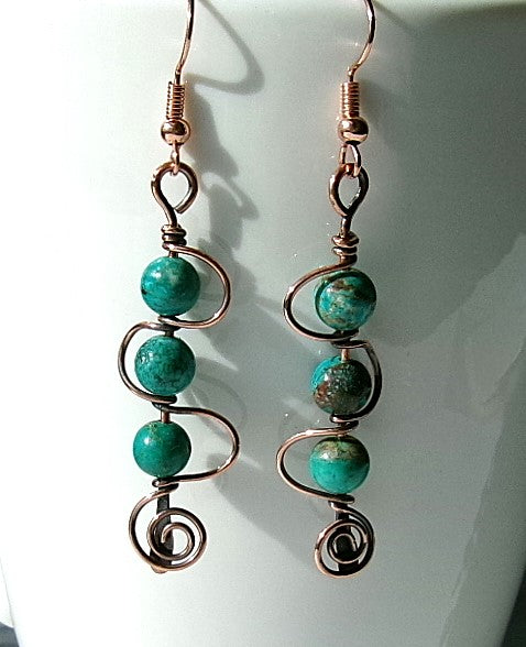 Turquoise copper wire earrings in stacked spiral design