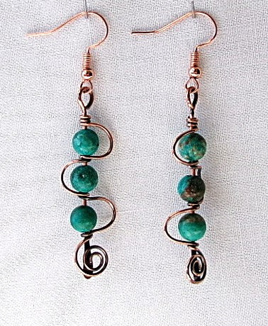 Turquoise copper wire earrings in stacked spiral design